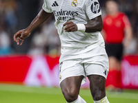 Vinicius Junior of Real Madrid CF is in action with the ball during the La Liga EA Sports 2024/25 football match between Real Madrid CF and...