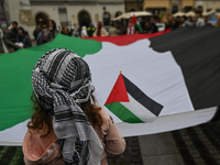 KRAKOW, POLAND - OCTOBER 5:
Pro-Palestinian activists gather in Krakow's UNESCO-listed Old Town for the 'March for Palestine,' calling for a...