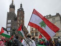 KRAKOW, POLAND - OCTOBER 5:
Pro-Palestinian activists gather in Krakow's UNESCO-listed Old Town for the 'March for Palestine,' calling for a...