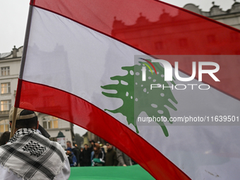 KRAKOW, POLAND - OCTOBER 5:
Pro-Palestinian activists gather in Krakow's UNESCO-listed Old Town for the 'March for Palestine,' calling for a...