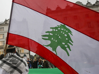 KRAKOW, POLAND - OCTOBER 5:
Pro-Palestinian activists gather in Krakow's UNESCO-listed Old Town for the 'March for Palestine,' calling for a...