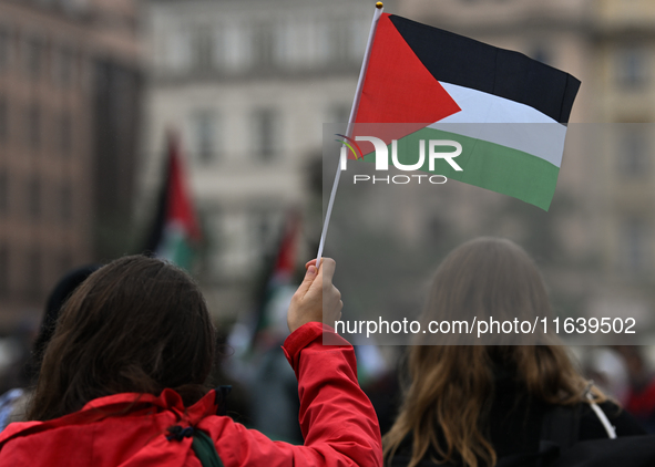 KRAKOW, POLAND - OCTOBER 5:
Pro-Palestinian activists gather in Krakow's UNESCO-listed Old Town for the 'March for Palestine,' calling for a...