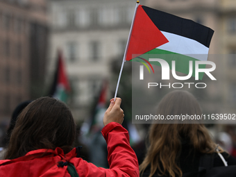 KRAKOW, POLAND - OCTOBER 5:
Pro-Palestinian activists gather in Krakow's UNESCO-listed Old Town for the 'March for Palestine,' calling for a...