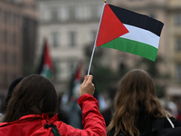 KRAKOW, POLAND - OCTOBER 5:
Pro-Palestinian activists gather in Krakow's UNESCO-listed Old Town for the 'March for Palestine,' calling for a...