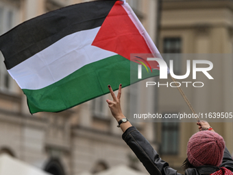 KRAKOW, POLAND - OCTOBER 5:
Pro-Palestinian activists gather in Krakow's UNESCO-listed Old Town for the 'March for Palestine,' calling for a...