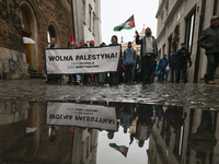 KRAKOW, POLAND - OCTOBER 5:
Pro-Palestinian activists gather in Krakow's UNESCO-listed Old Town for the 'March for Palestine,' calling for a...