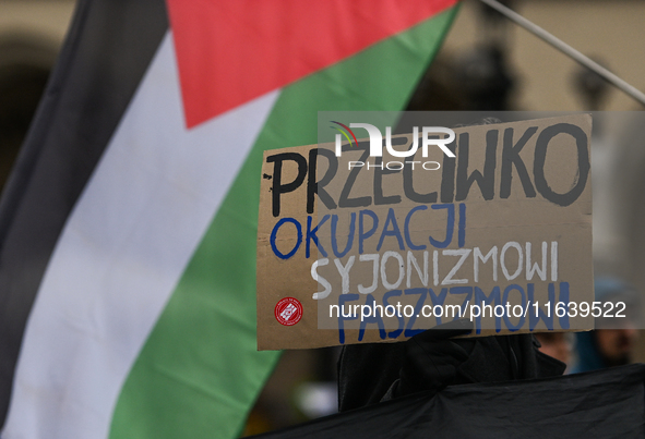 KRAKOW, POLAND - OCTOBER 5:
Pro-Palestinian activists gather in Krakow's UNESCO-listed Old Town for the 'March for Palestine,' calling for a...