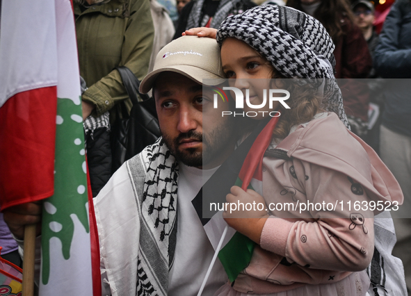 KRAKOW, POLAND - OCTOBER 5:
Pro-Palestinian activists gathered in front of the American Consulate in Krakow's UNESCO-listed Old Town during...