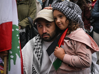 KRAKOW, POLAND - OCTOBER 5:
Pro-Palestinian activists gathered in front of the American Consulate in Krakow's UNESCO-listed Old Town during...