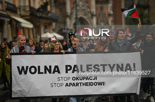 KRAKOW, POLAND - OCTOBER 5:
Pro-Palestinian activists gather in Krakow's UNESCO-listed Old Town for the 'March for Palestine,' calling for a...