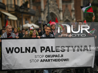 KRAKOW, POLAND - OCTOBER 5:
Pro-Palestinian activists gather in Krakow's UNESCO-listed Old Town for the 'March for Palestine,' calling for a...