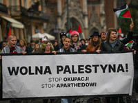 KRAKOW, POLAND - OCTOBER 5:
Pro-Palestinian activists gather in Krakow's UNESCO-listed Old Town for the 'March for Palestine,' calling for a...