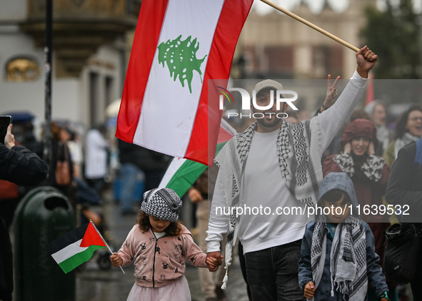 KRAKOW, POLAND - OCTOBER 5:
Pro-Palestinian and pro-Lebanon activists gather in Krakow's UNESCO-listed Old Town for the 'March for Palestine...