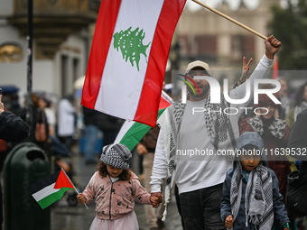 KRAKOW, POLAND - OCTOBER 5:
Pro-Palestinian and pro-Lebanon activists gather in Krakow's UNESCO-listed Old Town for the 'March for Palestine...