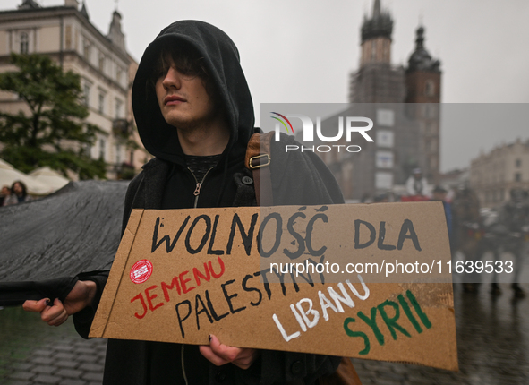 KRAKOW, POLAND - OCTOBER 5:
Pro-Palestinian activists gather in Krakow's UNESCO-listed Old Town for the 'March for Palestine,' calling for a...