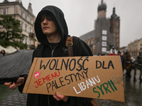 KRAKOW, POLAND - OCTOBER 5:
Pro-Palestinian activists gather in Krakow's UNESCO-listed Old Town for the 'March for Palestine,' calling for a...