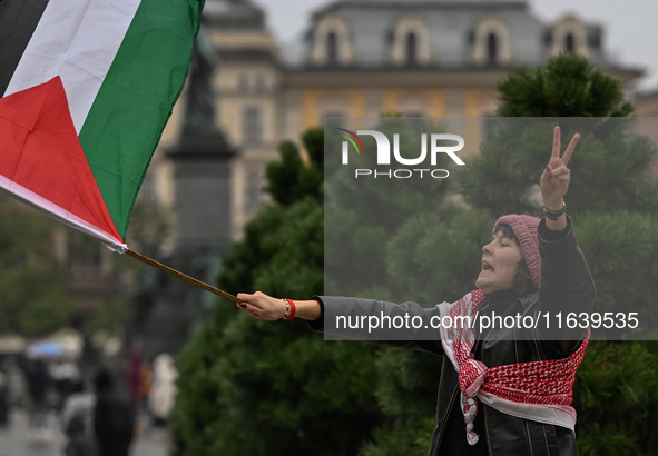 KRAKOW, POLAND - OCTOBER 5:
Pro-Palestinian activists gather in Krakow's UNESCO-listed Old Town for the 'March for Palestine,' calling for a...