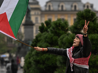 KRAKOW, POLAND - OCTOBER 5:
Pro-Palestinian activists gather in Krakow's UNESCO-listed Old Town for the 'March for Palestine,' calling for a...