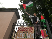 KRAKOW, POLAND - OCTOBER 5:
Pro-Palestinian activists gathered in front of the fence of the Institute of Sociology at Jagiellonian Universit...