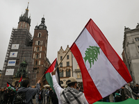 KRAKOW, POLAND - OCTOBER 5:
Pro-Palestinian activists gather in Krakow's UNESCO-listed Old Town for the 'March for Palestine,' calling for a...