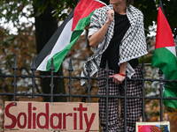 KRAKOW, POLAND - OCTOBER 5:
Pro-Palestinian activists gathered in front of the fence of the Institute of Sociology at Jagiellonian Universit...