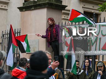 KRAKOW, POLAND - OCTOBER 5:
Pro-Palestinian activists gathered in front of the fence of the Institute of Sociology at Jagiellonian Universit...