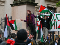 KRAKOW, POLAND - OCTOBER 5:
Pro-Palestinian activists gathered in front of the fence of the Institute of Sociology at Jagiellonian Universit...