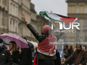 KRAKOW, POLAND - OCTOBER 5:
Pro-Palestinian activists gather in Krakow's UNESCO-listed Old Town for the 'March for Palestine,' calling for a...