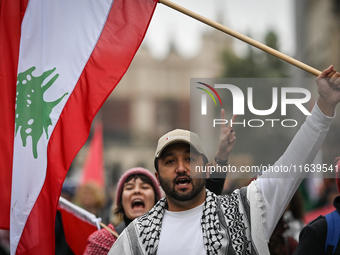 KRAKOW, POLAND - OCTOBER 5:
Pro-Palestinian and pro-Lebanon activists gather in Krakow's UNESCO-listed Old Town for the 'March for Palestine...