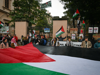 KRAKOW, POLAND - OCTOBER 5:
Pro-Palestinian activists gathered in front of the fence of the Institute of Sociology at Jagiellonian Universit...