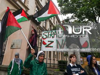 KRAKOW, POLAND - OCTOBER 5:
Pro-Palestinian activists gathered in front of the fence of the Institute of Sociology at Jagiellonian Universit...