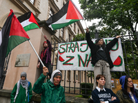 KRAKOW, POLAND - OCTOBER 5:
Pro-Palestinian activists gathered in front of the fence of the Institute of Sociology at Jagiellonian Universit...