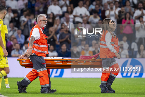 The injured Daniel Carvajal of Real Madrid CF is carried out on a stretcher by the doctors during the La Liga EA Sports 2024/25 football mat...