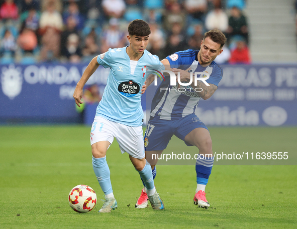 Angel Arcos of Celta Fortuna and Thomas Carrique of SD Ponferradina are in action during the Spanish football 1 Federation Group 1, JOR 7, b...