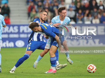 David Andujar of SD Ponferradina and Oscar Marcos of Celta Fortuna are in action during the Spanish football 1st Federation Group 1, JOR 7 m...