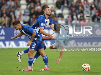 David Andujar of SD Ponferradina and Oscar Marcos of Celta Fortuna are in action during the Spanish football 1st Federation Group 1, JOR 7 m...