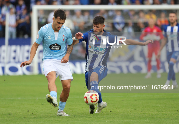 Borja Valle of SD Ponferradina and Tincho of Celta Fortuna are in action during the Spanish football 1st Federation Group 1, JOR 7 match bet...