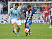 Borja Valle of SD Ponferradina and Tincho of Celta Fortuna are in action during the Spanish football 1st Federation Group 1, JOR 7 match bet...