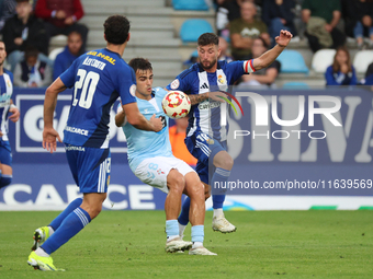 Miguel Roman of Celta Fortuna and Borja Valle of SD Ponferradina are in action during the Spanish football 1 Federation Group 1, JOR 7, betw...