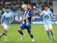 Borja Valle of SD Ponferradina, Tincho of Celta Fortuna, and Angel Arcos of Celta Fortuna are in action during the Spanish football 1st Fede...