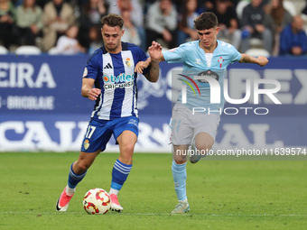 Thomas Carrique of SD Ponferradina and Angel Arcos of Celta Fortuna are in action during the Spanish football 1st Federation Group 1, JOR 7...