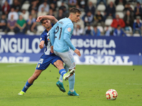 Manu Fernandez of Celta Fortuna and Alex Costa of SD Ponferradina play during the Spanish football 1 Federation Group 1, JOR 7 match between...