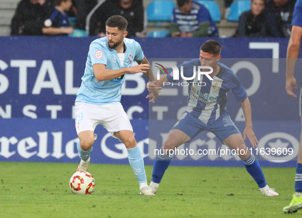 Jordi Escobar of Celta Fortuna and Brais Abelenda of Ponferradina play during the Spanish Football 1 Federation Group 1, JOR 7, between SD P...