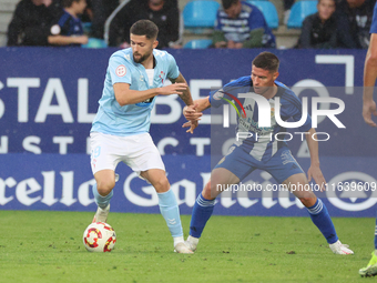 Jordi Escobar of Celta Fortuna and Brais Abelenda of Ponferradina play during the Spanish Football 1 Federation Group 1, JOR 7, between SD P...