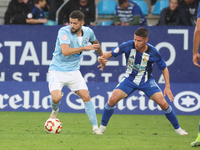 Jordi Escobar of Celta Fortuna and Brais Abelenda of Ponferradina play during the Spanish Football 1 Federation Group 1, JOR 7, between SD P...