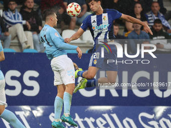 Alex Costa of SD Ponferradina and Manu Fernandez of Celta Fortuna are in action during the Spanish football 1st Federation Group 1, JOR 7 ma...