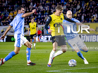 NAC Breda defender Lars Mol, NEC defender Bram Nuytinck, and NEC defender Ivan Marquez are present during the match between NAC and NEC at t...