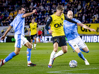 NAC Breda defender Lars Mol, NEC defender Bram Nuytinck, and NEC defender Ivan Marquez are present during the match between NAC and NEC at t...