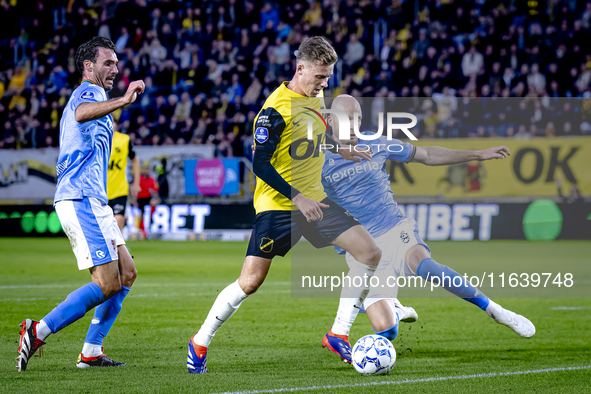 NAC Breda defender Lars Mol, NEC defender Bram Nuytinck, and NEC defender Ivan Marquez are present during the match between NAC and NEC at t...