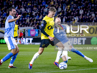 NAC Breda defender Lars Mol, NEC defender Bram Nuytinck, and NEC defender Ivan Marquez are present during the match between NAC and NEC at t...